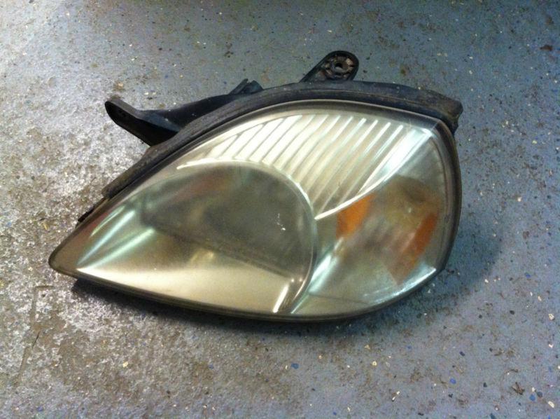 2004 kia rio drivers side headlight 