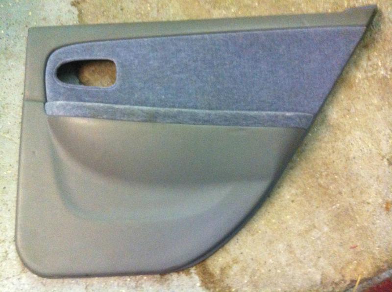 Kia optima rear passenger side door panel 