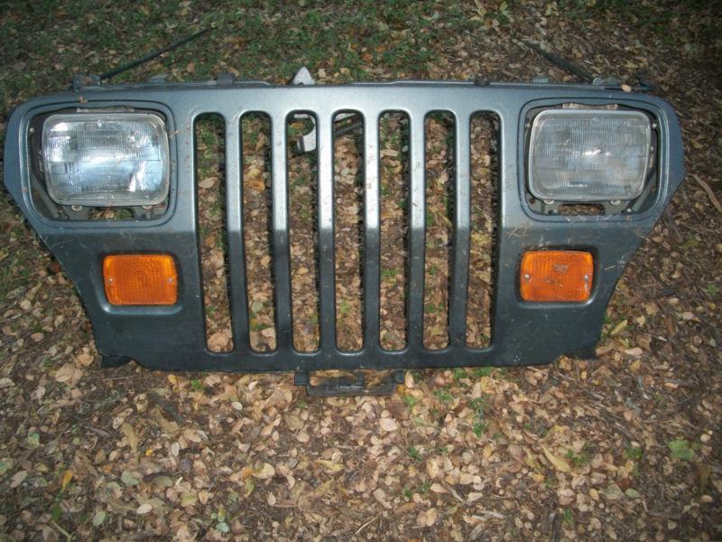 Jeep wrangler 87 88 89 90 91 92 93 94 95 grille front assembly & headlights oem 