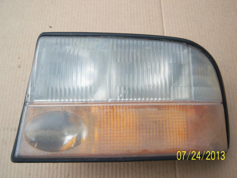 2000 gmc jimmy left side headlight assembly