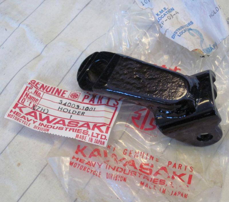 Kawasaki kl250 a1 a1a a2 a3 a4 left side footrest bracket holder 34003-1001 nos