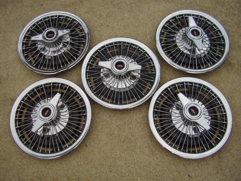 !964 wire spoke hubcaps w/ spinners, olds f-85 cutlass, (set of 5)