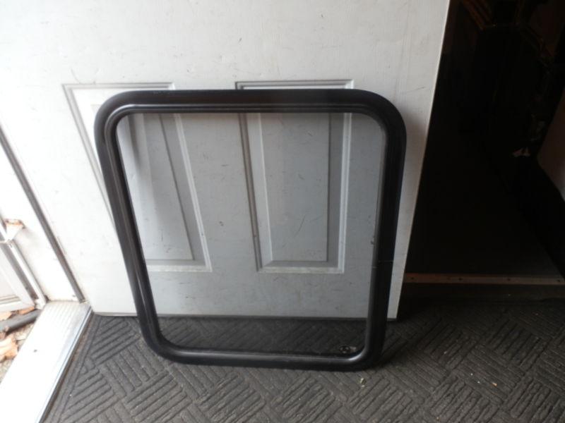 Rv black clear solid window r.o. 29" tall x 24" wide ( used )