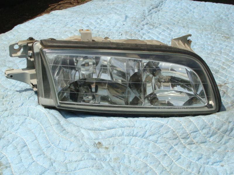 1997 98 99 00 millenia headlight complete rh