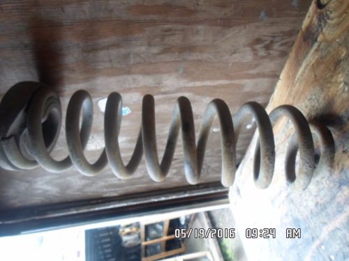 06 ford f550 left side front coil spring assy