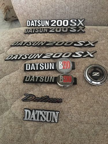 Datsun oem emblems lot.