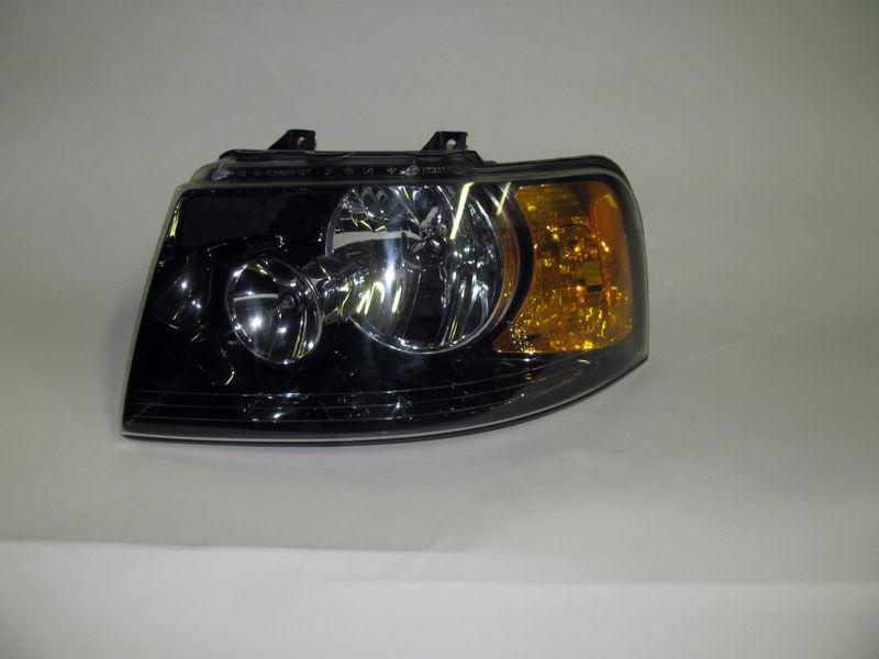 03 04 05 06 ford expedition oem left headlight nice!