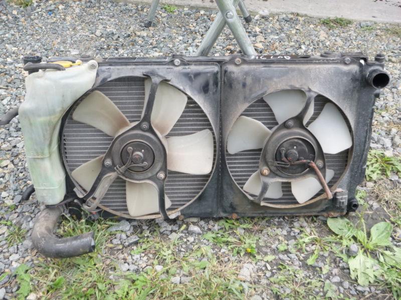 1996 subaru legacy outback radiator w/cooling fans w/overflow bottle used