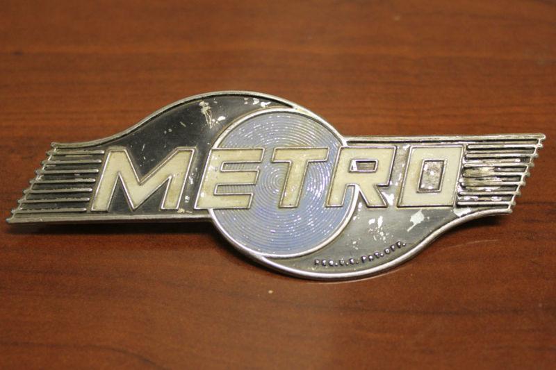 Original vintage metro badge logo grill emblem.  