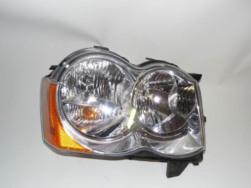 08 09 2010 2011 2012 jeep grand cherokee oem right halogen headlight nice! 