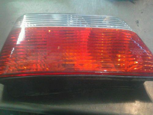 A driver side tail light from a 1996 bmw 325i