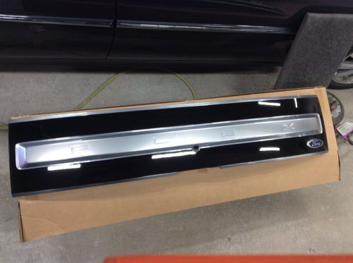 2015 ford flex oem rear liftgate trim panel  finish black satin aluminum limited