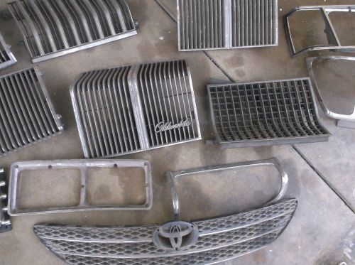 Lot of misc. automotive grill fronts &amp; head light inserts unknown models &amp; makes