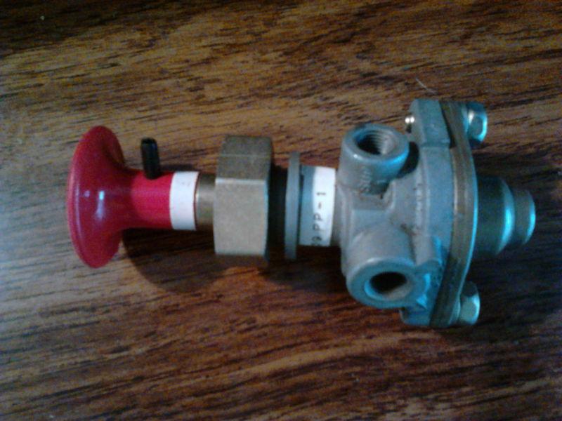 Emergency air brake control switch valve