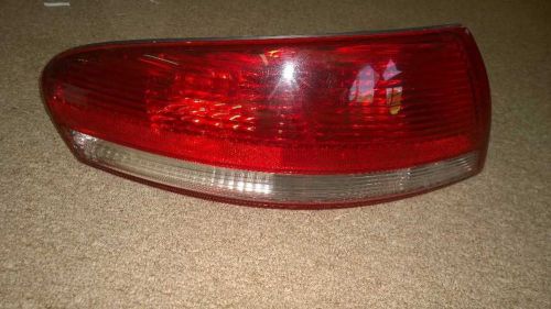 04 chrysler sebring covertible driver left tail light oem guarantee 171-s-7