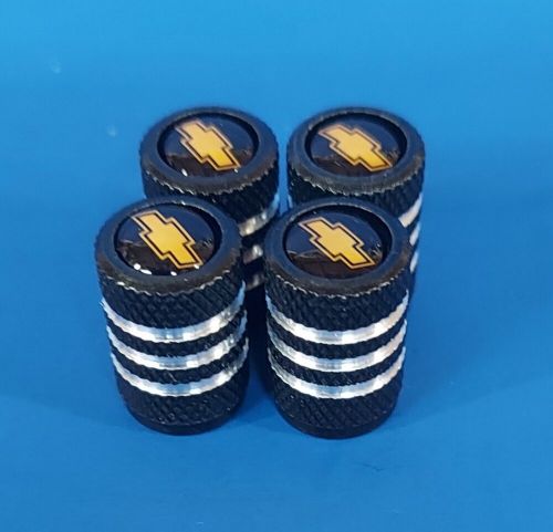 Chevy chevrolet valve stem caps/covers  black gold chevy emblem set of 4