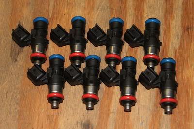 Set of 8 fuel injectors ls7 corvette z06 new takeoffs