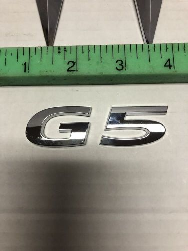 Pre-owned like new oem pontiac g5 emblem set