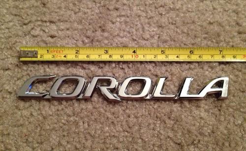 Used in great shape oem rear "corolla" emblem for 2003-2007 toyota corolla