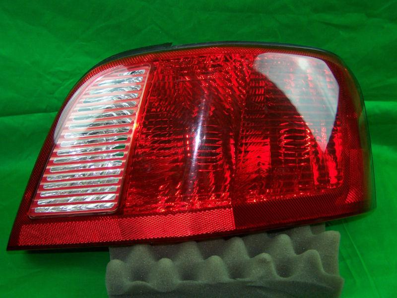 Used 2003 mitsubisi galant right side tail light oem passenger side