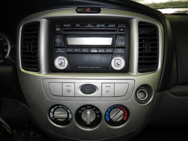 2005 mazda tribute speedomter and radio trim dash bezel 2654415