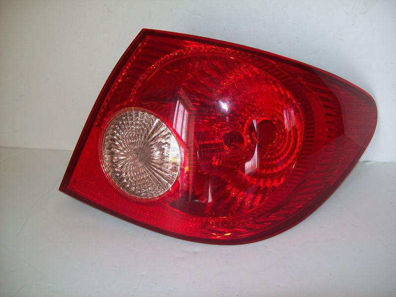 2004-08 toyota corolla taillight taillamp brake light right passenger side 