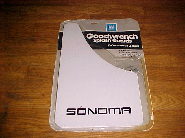 2 nos mud flaps-splash guards gmc sonoma in white