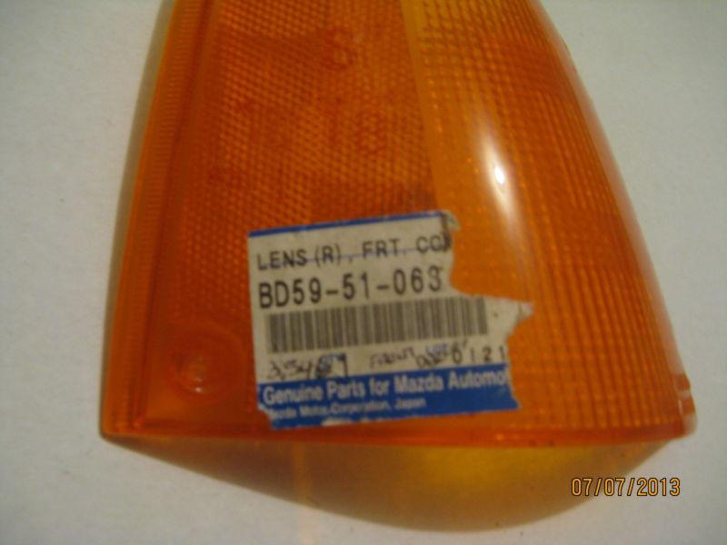 Mazda  glc  1983-1985  rh  pass. side  corner  lens new  oem  