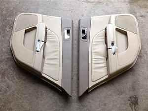 05 06 07 cadillac sts pair of rear door trim panels oem