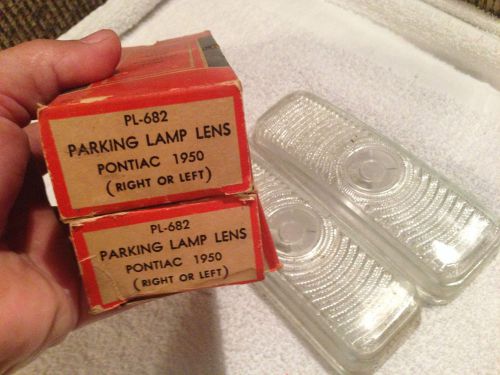 Pair of nors 1950 pontiac glass parking light lens  lynx eye #pl 682