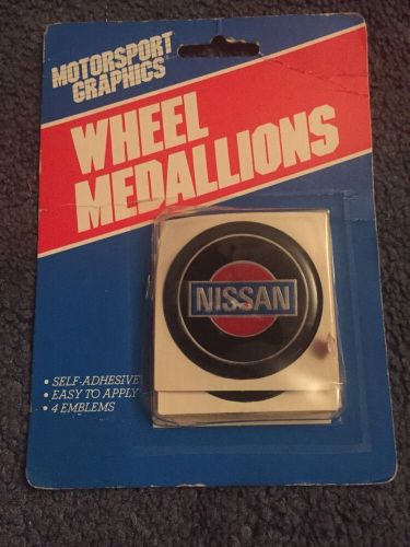 1982 wheel medallions. new