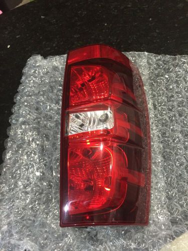 Used oem taillight for 2007-2014 chevy tahoe or suburban (lh/driver side)