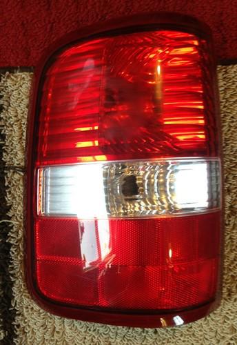 2007 ford f150 left/driver  side oem tail light