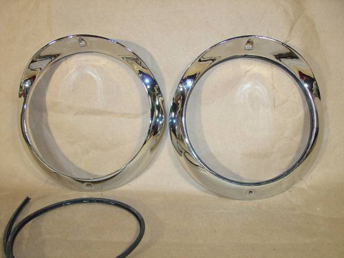 1955 chevrolet bel air, 210, 150  headlight  bezels 2nds or blems driver quality