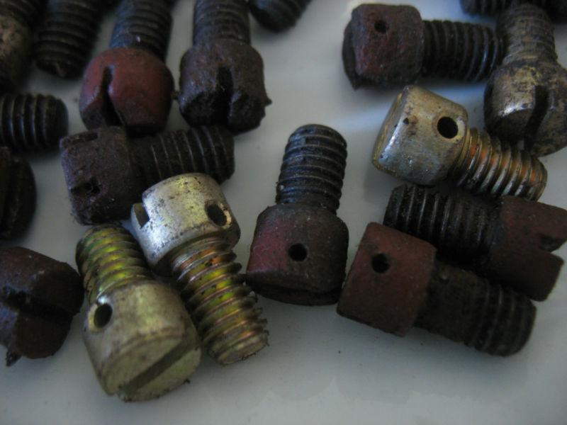 32 old bolts from ford automobile car restorer with tie down holes 