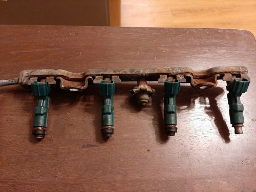 Fuel injection rail w/ 4 injectors 1.5l fits 04-06 scion xb