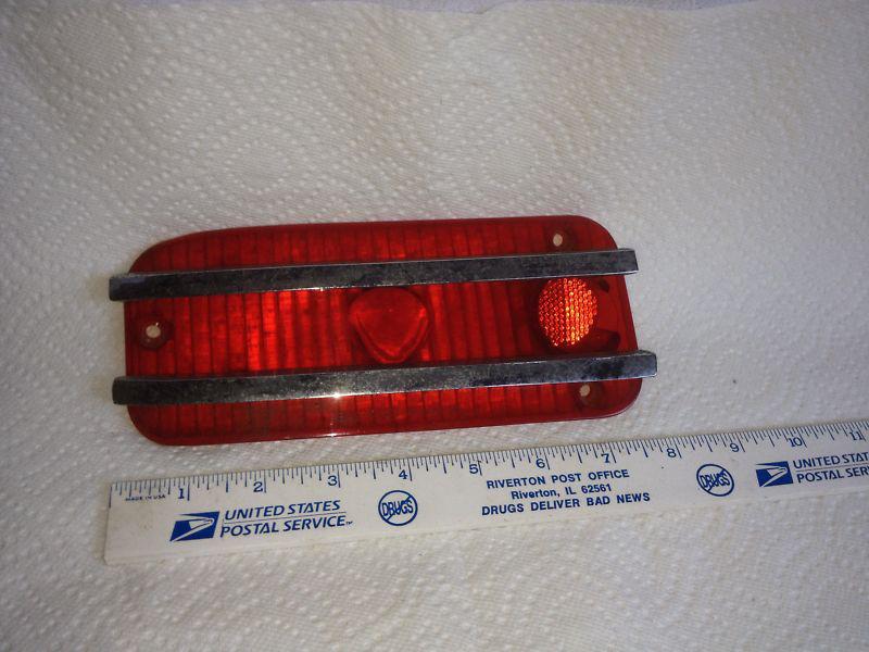 Amc tail light lens; nos and pitted.   item:  2937