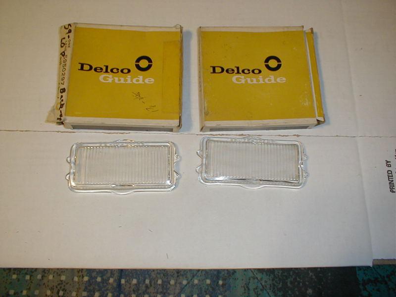 Nos 1959 chevrolet impala glass backup lamp lenses...pair...