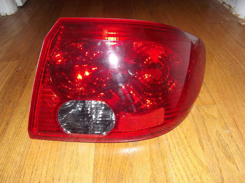 Saturn l-300 tail light right passenger side rear 2004