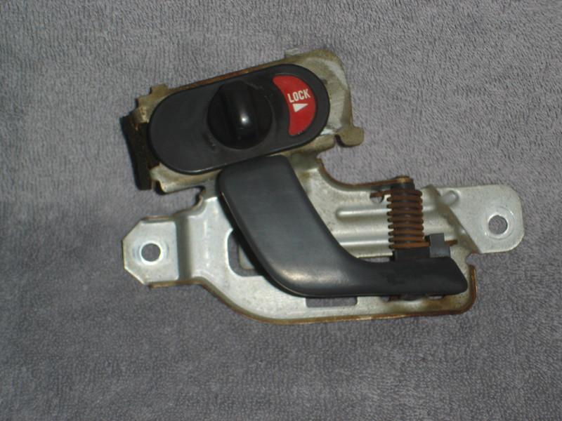 90 dodge colt interior door handle with lock mechanism passenger side 