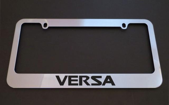 1 brand new nissan versa chrome metal license plate frames + screw caps