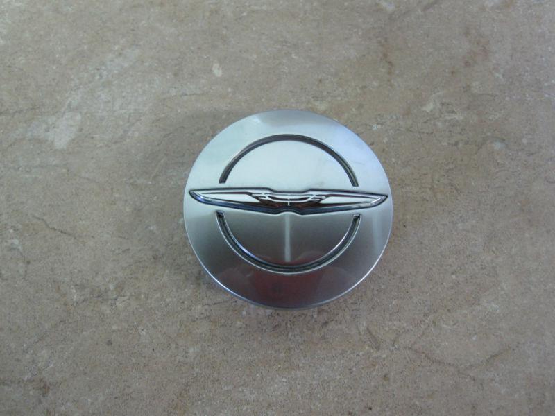 Chrysler town and country center caps #1lb74trmab set of four (4)