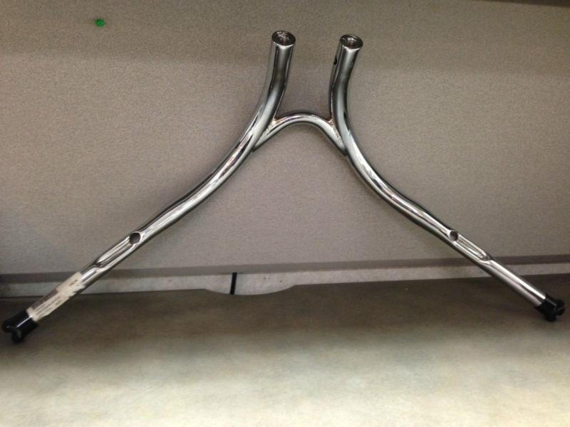 New 1.25" chrome ram lo bars dimpled.  part # 1803-0284