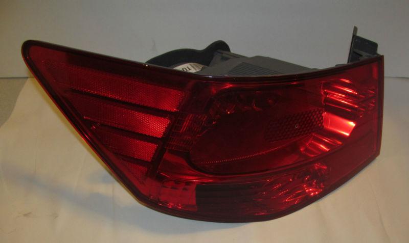 Kia forte left tail light oem 92401