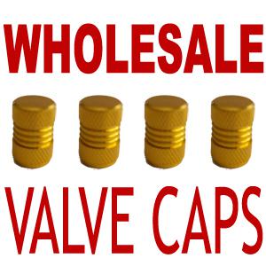  4  aluminum (premium) valve stem caps ( gold )^ 