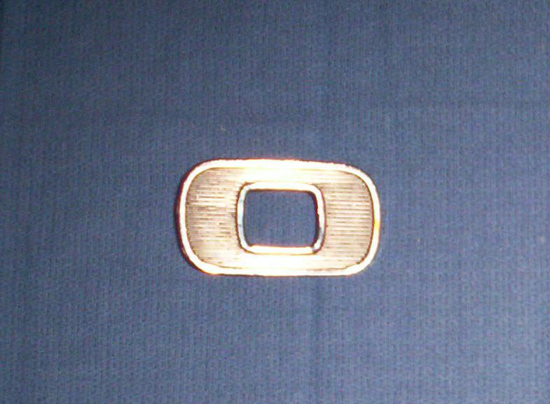 The "o" letter/badge/insignia from the hood of a ford fairlane or 68 ranchero