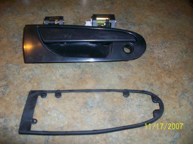 New mopar exterior rt door handle #05175332aa