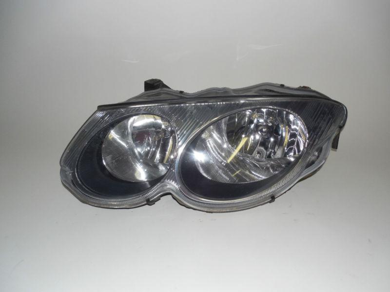 99 00 01 02 03 chrysler 300m oem left headlight nice!