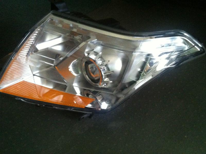 2010-12 gm cadillac srx left side headlight assy  oem# 22853873