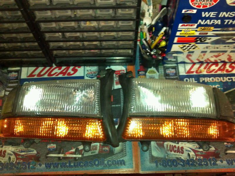 01 dodge durango headlights with bulbs! nice! fits dakota's and many other years